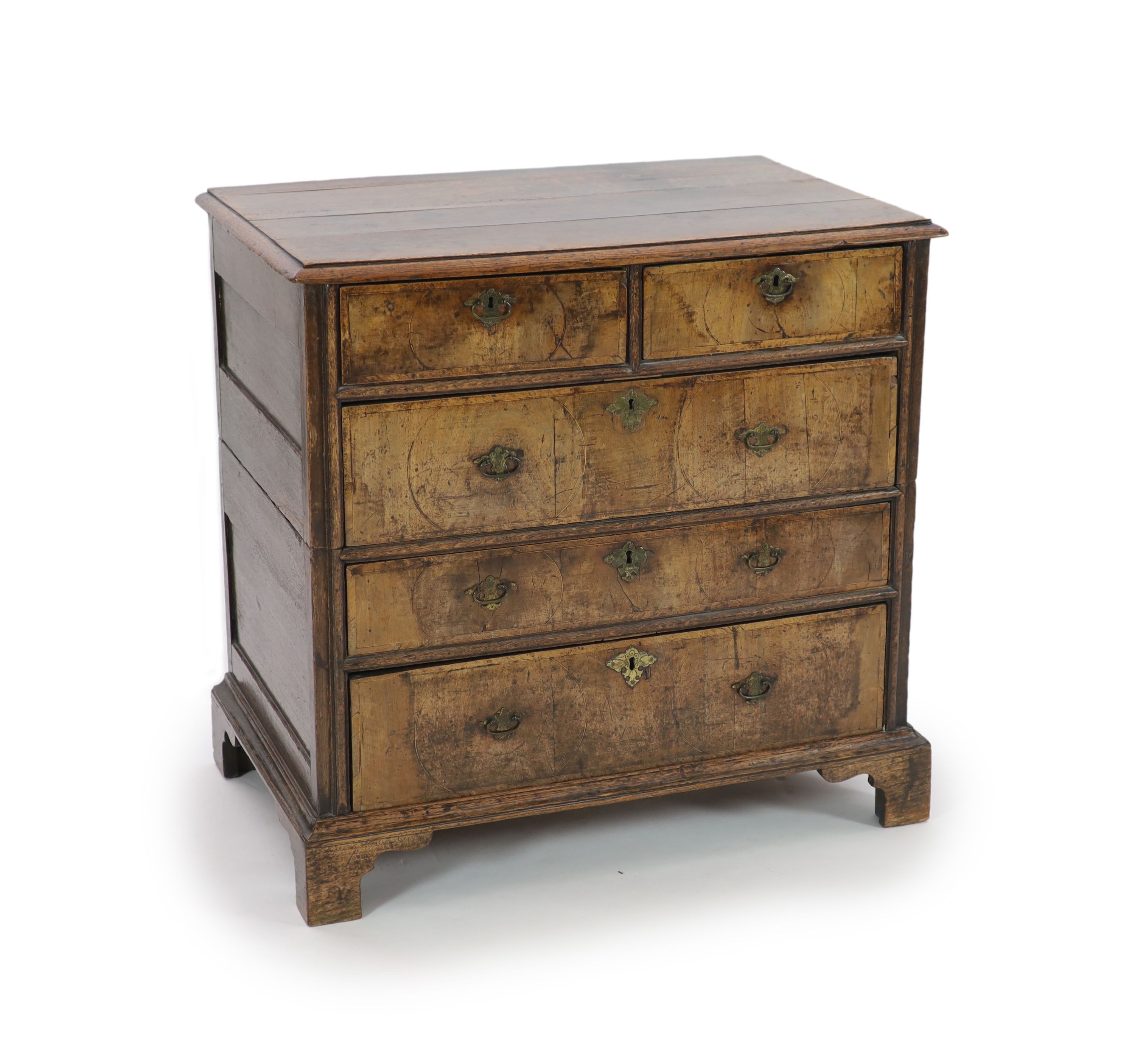 An early 18th century oak and walnut chest, W.94cm D.61cm H.91cm